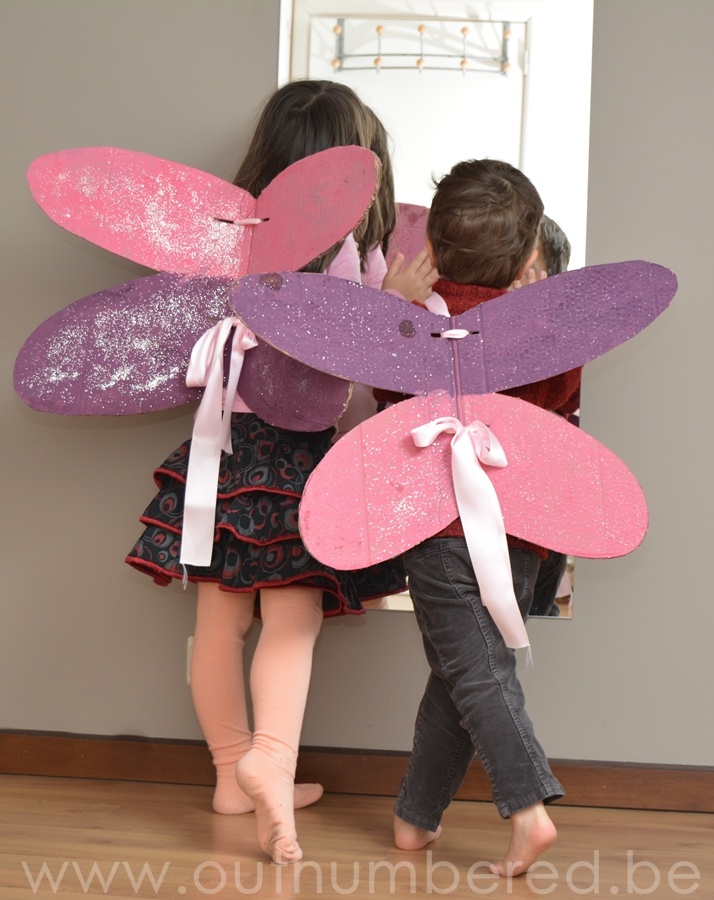 The kids made their own cardboard fairy wings. So much fun!